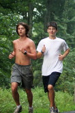 Matt Adams and Zach Roether in the woods