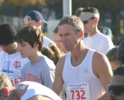 Tyler McAdam and Coach among the elite runners