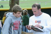 Tim Frantz checks Coach Cal's numbers!