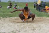 Steve Watson hits the pit in the Triple Jump