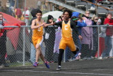 Aaron DeCaires to Mike Schiafone in the 4 X 400m