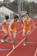 Rob Roselli to Marc Saccomanno in the 4 X 400m
